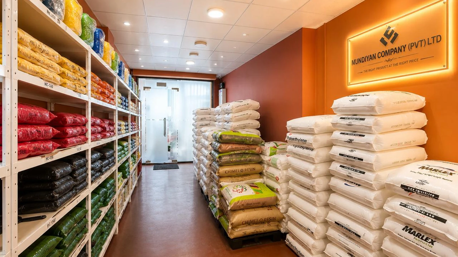 Mundiyan warehouse interior with stocked polymer materials